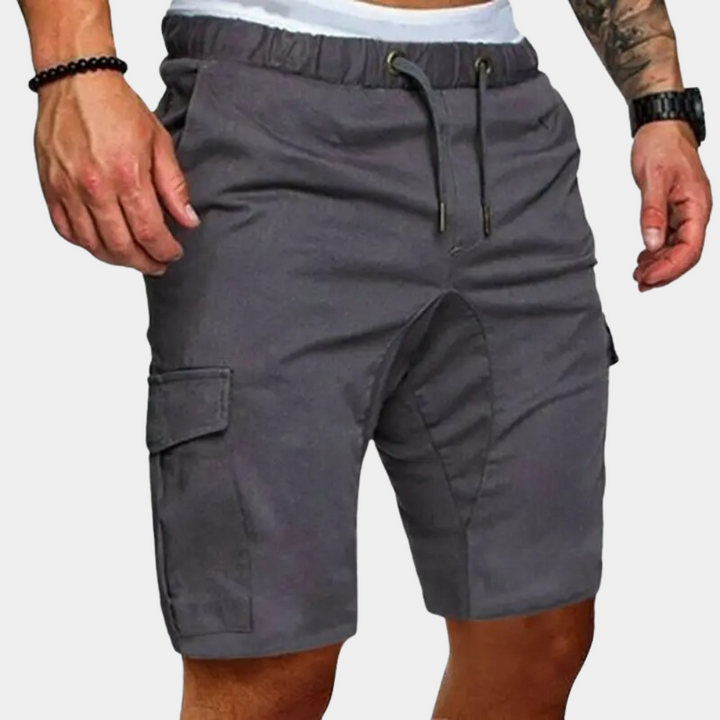 Grijze cargo herenshorts met elastische tailleband en trekkoord, zijzakken, casual stijl. Perfect voor zomerse outdoor activiteiten.