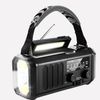 Emergency radio with hand crank, solar panel, and power bank function